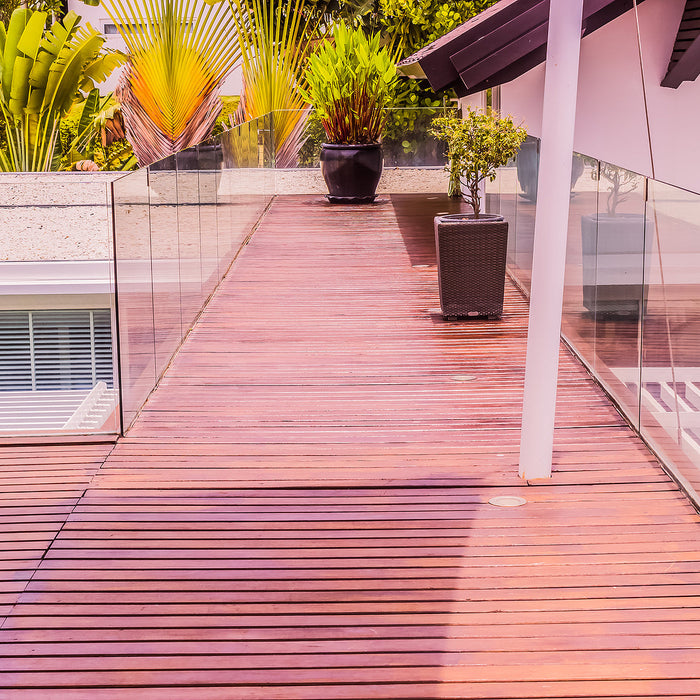 glass balustrade clamps - Tempered glass balustrades on wooden roof deck