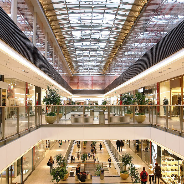 glass hardware - passage in a multilevel shopping mall