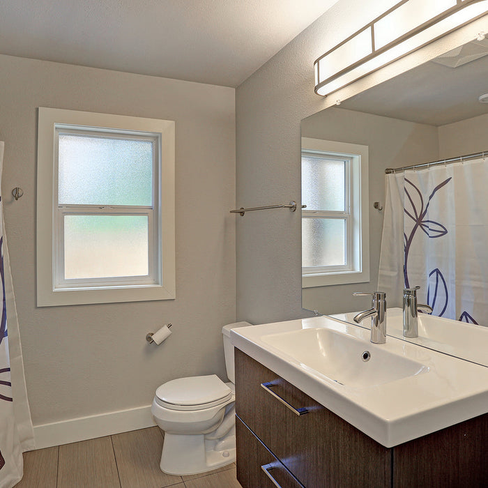 heavy mirror fixings - bathroom interior with a single vanity cabinet