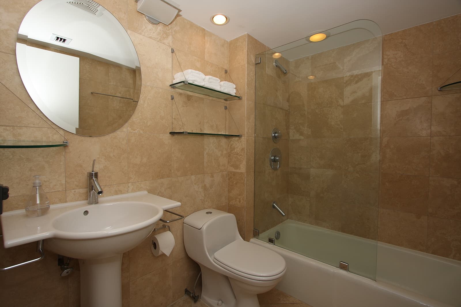  light bulb door knobs - Beautifully designed bathroom with tub and glass.